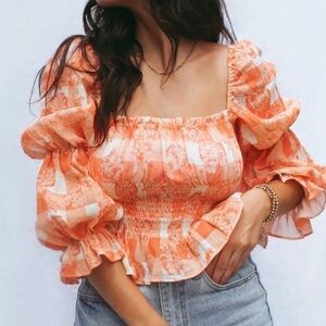Olivaceous Orange Smocked Puff Sleeve Top